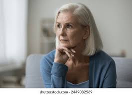 Senior lady thinking of life experiences