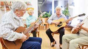 senior playing a musical instrument